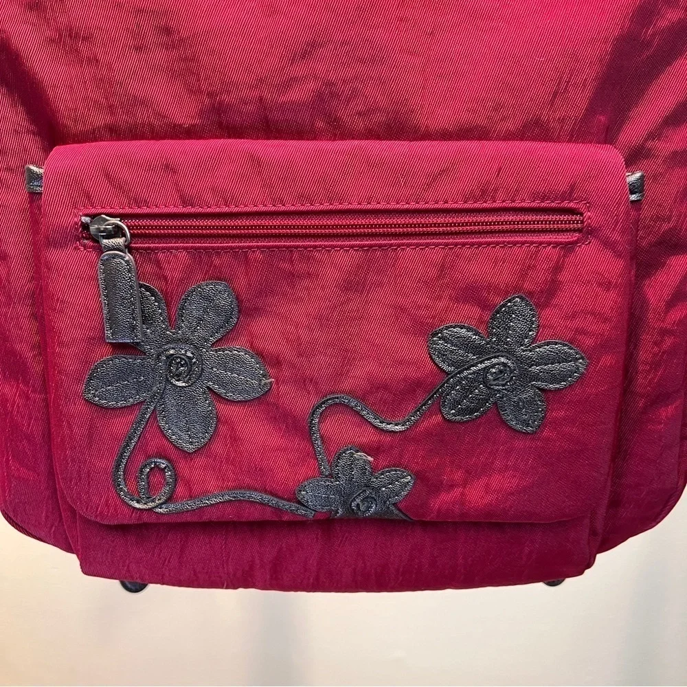 CORTILE FABRIC BACKPACK. Adj Straps. Front Flap Pocket w/snap & zipper pocket